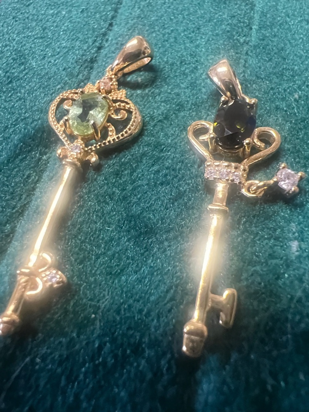 Gold Key Pendant Necklace with Green and Dark Gemstones